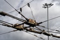 Trolleybus wires against the blue sky. close up. Royalty Free Stock Photo