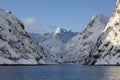 Trollfjord with snow-capped mountains