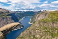 `Trolltunga, Troll`s tongue rock above lake Ringedalsvatnet, Norway` Royalty Free Stock Photo