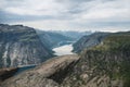 Trolltunga, view on troll tongue reef over the lake. Beautiful nature. Tourist popular place. Ringedalsvatnet, Odda, Norway. Royalty Free Stock Photo