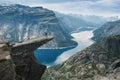 Trolltunga, view on troll tongue reef over the lake. Beautiful nature. Tourist popular place. Ringedalsvatnet, Odda, Norway. Royalty Free Stock Photo