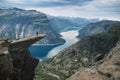 Trolltunga, view on troll tongue reef over the lake. Beautiful nature. Tourist popular place. Ringedalsvatnet, Odda, Norway. Royalty Free Stock Photo
