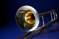 Trombone Isolated Blue Bk Royalty Free Stock Photo