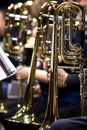 Trombones in the hands of musicians