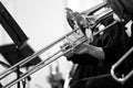 Trombones in the hands of the musicians