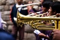 Trombones playing in a big band.