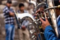 Trombones playing in a big band.