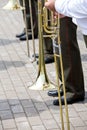 Trombones playing in a big band