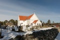 Tromoy church at Hove, Tromoy in Arendal, Norway. White church, blue sky, sunny day.