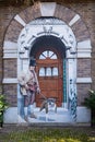 Trompe-l`oeil mural of victorian man with bulldog