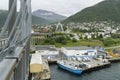 Tromso city viewed from a Troms Bridge with arctic cathedral and houses Royalty Free Stock Photo