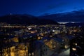 Tromso city at winter snowy night with light,traffic,fjord and motion with mainland Royalty Free Stock Photo