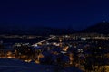 Tromso city at winter snowy night with light,traffic,fjord and motion with mainland Royalty Free Stock Photo