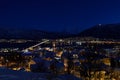 Tromso city at winter snowy night with light,traffic,fjord and motion with mainland Royalty Free Stock Photo