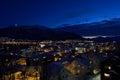 Tromso city at winter snowy night with light,traffic,fjord and motion with mainland Royalty Free Stock Photo