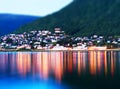 Tromso community with lights reflections bokeh background