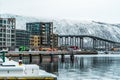 New modern buildings and bridge to Tromsdalen on a winter day in Tromso, Norway Royalty Free Stock Photo