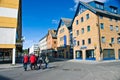 Tromso Norway, old town street with tourists Royalty Free Stock Photo