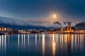 Tromso\'s Urban Night View: Arctic Cityscape Bathed in Full Moonlight with Bridge Royalty Free Stock Photo