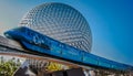 Tron Monorail in front of Epcot`s Spaceship Earth