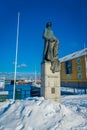 TRONDHEIM, NORWAY - APRIL 04, 2018: View of the Last Viking Statue, silhouetted against blue sky. Bronze figure with