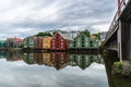 Trondheim river front under cloudy sky