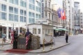 Troops with USA flag on the American part of Checkpoint Charlie Royalty Free Stock Photo