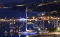 Tropea, Italy - September 6, 2019: Panorama of Tropea yacht sea port with beautiful night colorful lights. 