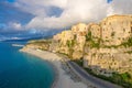 Tropea town and Tyrrhenian Sea beach, colorful buildings on top of high big steep rock cliff, view from Sanctuary church of Santa Royalty Free Stock Photo