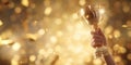 The trophy held high in celebration amidst a festive golden backdrop. AI generated image Royalty Free Stock Photo