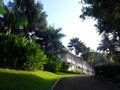 Tropical antique colonial house with landscaping Royalty Free Stock Photo