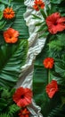 Tropical arrangement with red and orange flowers and lush green leaves, ideal for exotic and vibrant summer designs Royalty Free Stock Photo