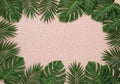 Tropical Leaves Border on Shimmering Rose Gold Glitter Background Copy Space Frame Royalty Free Stock Photo