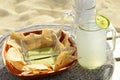 Green avocado salsa dip, tortilla chips, lemonade, beach snack, Baja, Mexico Royalty Free Stock Photo