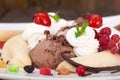 Tropical banana split with chocolate drizzle Royalty Free Stock Photo