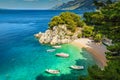 Tropical bay and beach with motorboats, Brela, Dalmatia region, Croatia Royalty Free Stock Photo