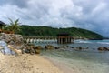 tropical beach in Banda Aceh, Indonesia. Eky Momong Beach. Resataurant at the beach. Concrete bridge leading to water villa or