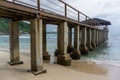 tropical beach in Banda Aceh, Indonesia. Eky Momong Beach. Resataurant at the beach. Concrete bridge leading to water villa or