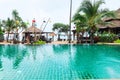 Tropical beach bars and restaurant with big clear swimming pool