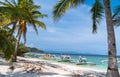 Tropical beach with boats on the Malcapuya Island, Busuanga