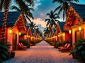 Tropical Beach Bungalows Lit by Lanterns and String Lights at Sunset Royalty Free Stock Photo