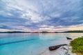 Tropical beach, caribbean sea, transparent turquoise water, remote Togean Islands Togian Islands, Sulawesi, Indonesia. Dramatic Royalty Free Stock Photo