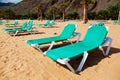 Tropical Beach Chaise-Longues Royalty Free Stock Photo