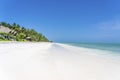 Tropical beach with coconut palm trees on the island of Zanzibar, Tanzania, Africa. Travel and vacation concept Royalty Free Stock Photo