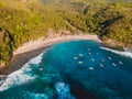 Tropical beach with coconut palms and ocean. Crystal bay, Nusa Penida Royalty Free Stock Photo