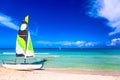 Tropical beach with a colorful sailboat on a summer day with turquoise water and blue sky. Varadero resort, Cuba