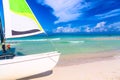 Tropical beach with a colorful sailboat on a summer day with turquoise water and blue sky. Varadero resort, Cuba