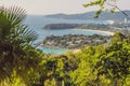 Tropical beach landscape panorama. Beautiful turquoise ocean waives with boats and sandy coastline from high view point. Kata and Royalty Free Stock Photo