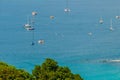 Tropical beach landscape panorama. Beautiful turquoise ocean waives with boats and sandy coastline from high view point. Kata and Royalty Free Stock Photo