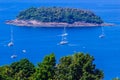 Tropical beach landscape panorama. Beautiful turquoise ocean waives with boats and sandy coastline from high view point. Kata and Royalty Free Stock Photo